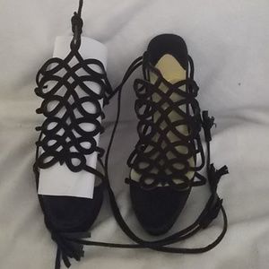 Black suede heels with ankle straps